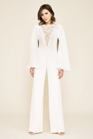 white jumpsuit with cape sleeves