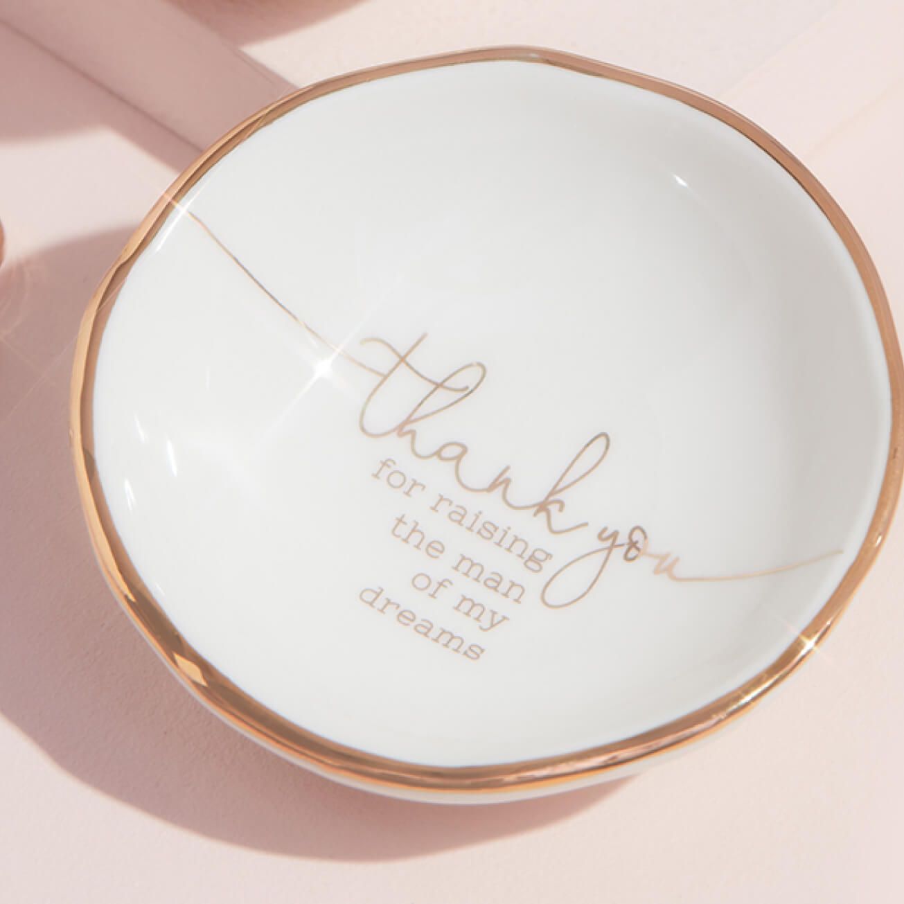 white with gold trim ring dish with thank you for raising the man of my dreams printed on it