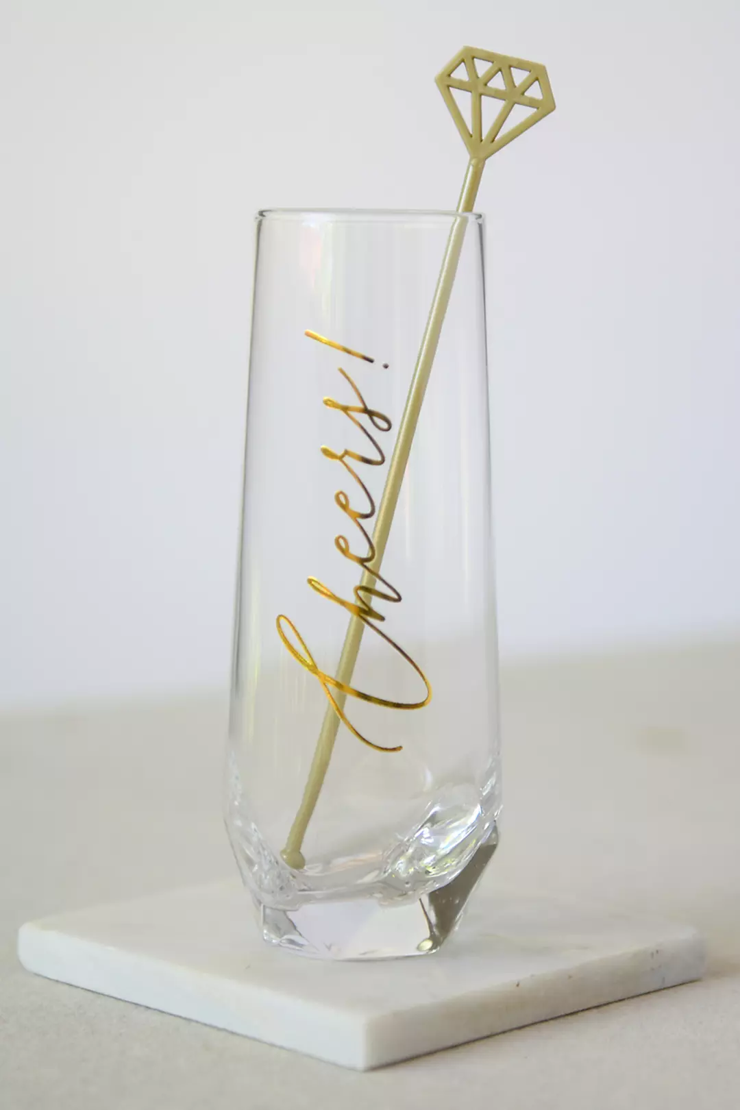 Cheers Glass with Cocktail Pick Image