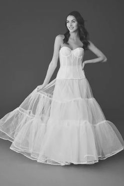woman in ball gown shapewear