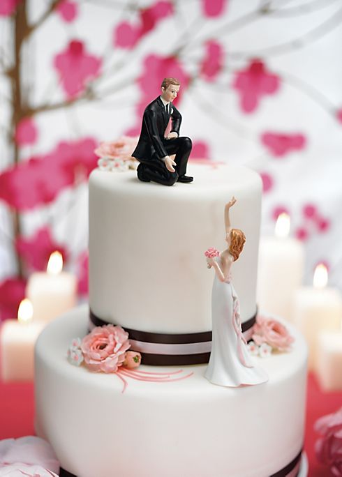 Reaching Bride and Helpful Groom Cake Toppers Image