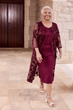 grandmother in a red occasion dress