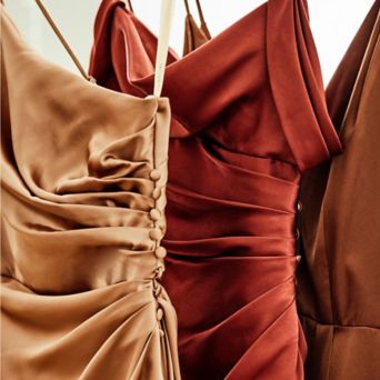 dresses hanging on a dress rack