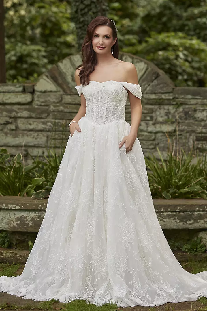 basque waist lace wedding dress Fit and flare with and long sleeves Crafted from exquisite Chantilly lace Basque Waist Lace Ball Gown