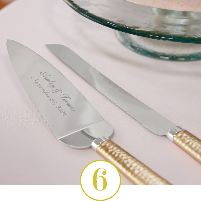 closeup of engraved cake knife set