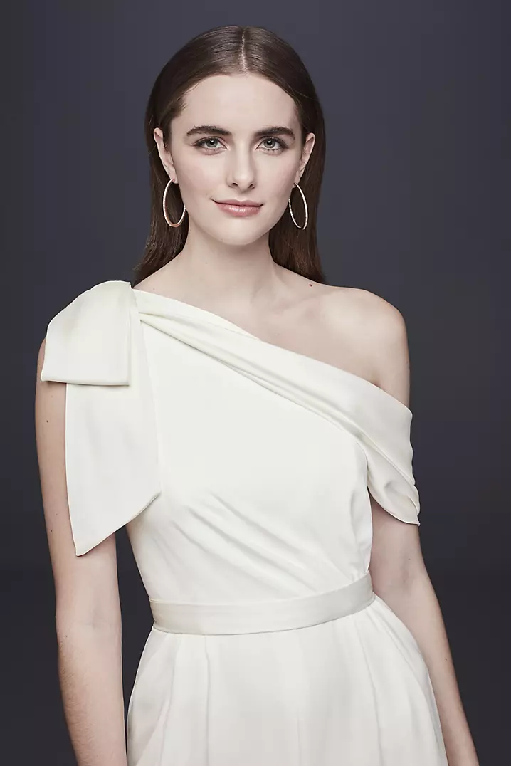 One-Shoulder Crepe Wedding Jumpsuit with Bow | David's Bridal One-Shoulder Crepe Wedding Jumpsuit with Bow | David's Bridal