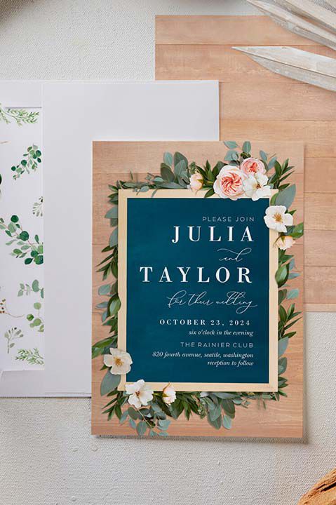 wedding invitation and envelope on a table