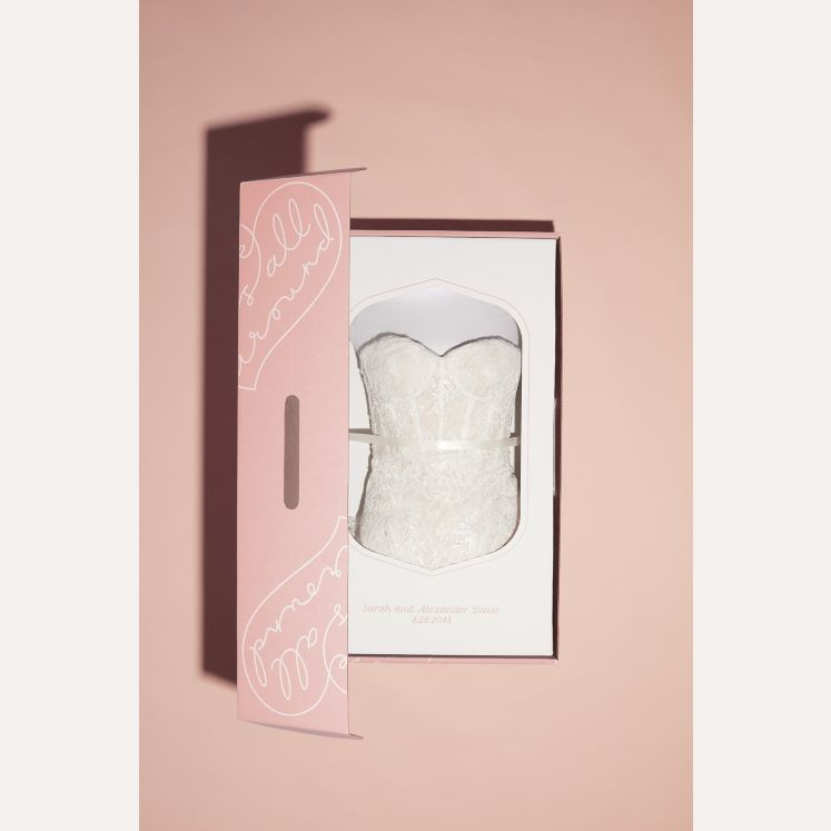 wedding dress displayed in box