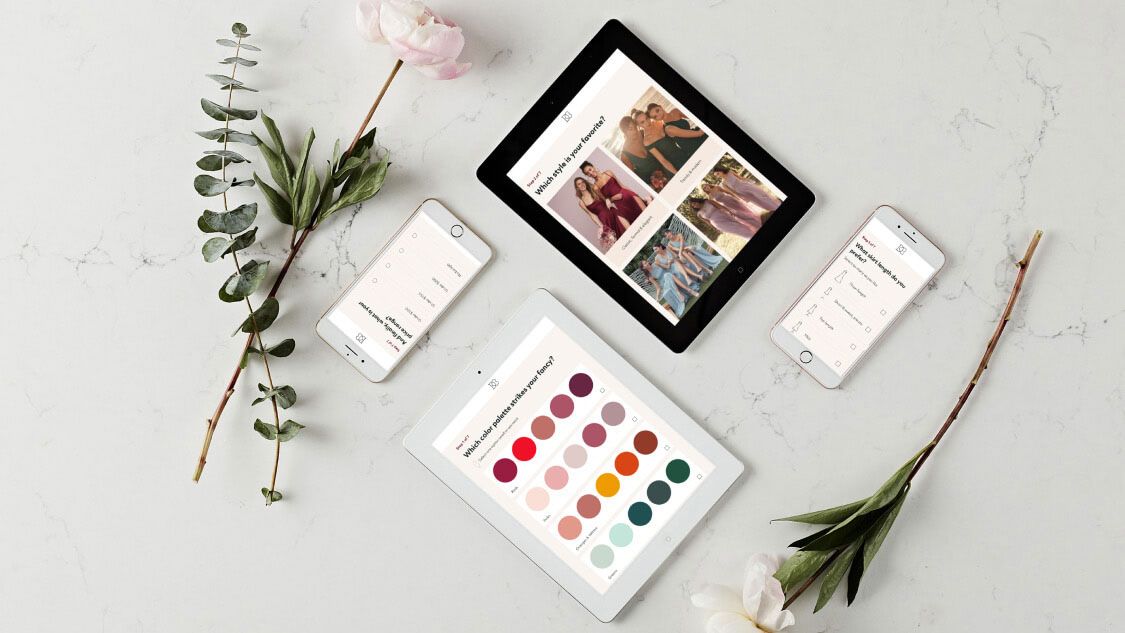 phones and tablets on marble table with flowers using DB app