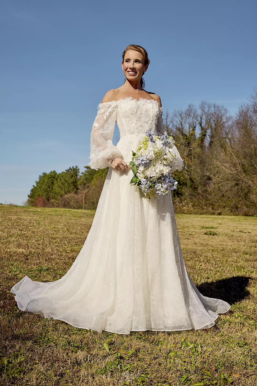 Billowy Long Sleeve Off-the-Shoulder Wedding Dress | David's Billowy Long Sleeve Off-the-Shoulder Wedding Dress | David's
