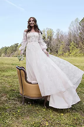 Billowy Long Sleeve Off-the-Shoulder Wedding Dress | David's Billowy Long Sleeve Off-the-Shoulder Wedding Dress | David's