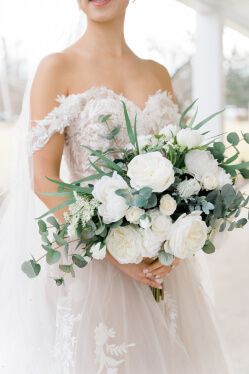 bride holding a flower bouquet
