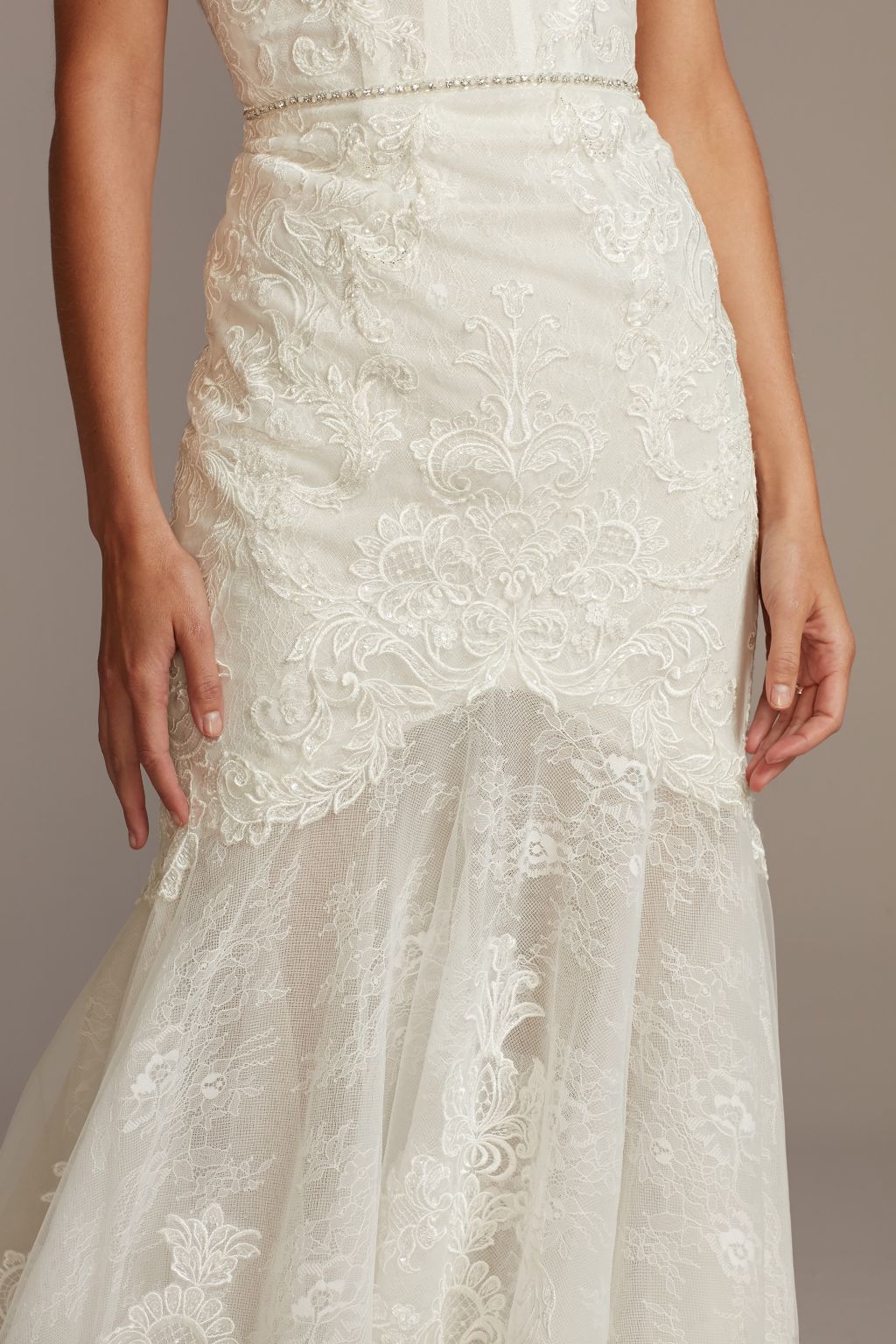 closeup of bride wearing a mermaid sheath wedding dress