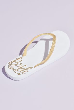 white and gold flip flops