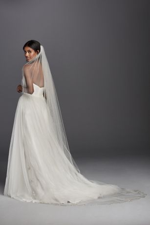 a line wedding dress with veil
