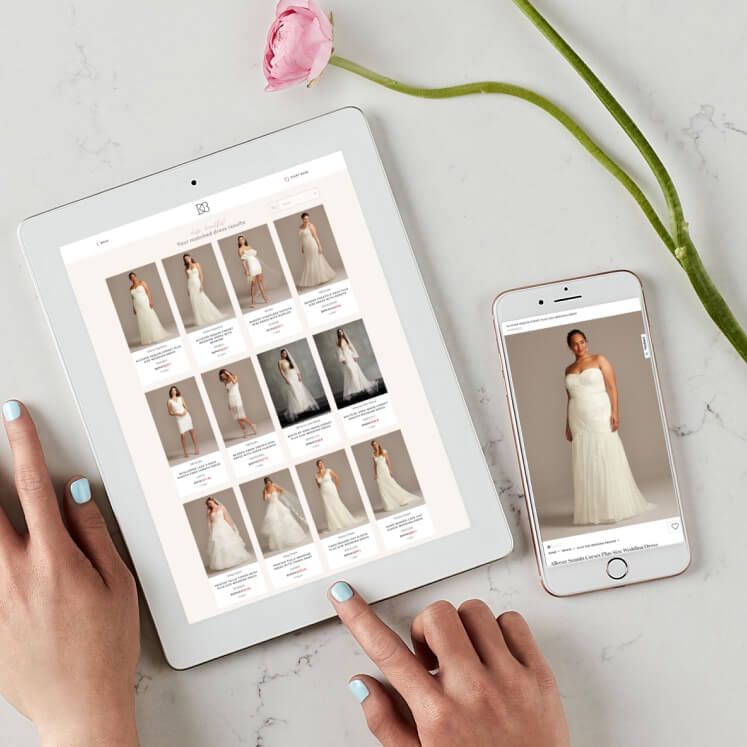 hands using a tablet and phone to take wedding quiz