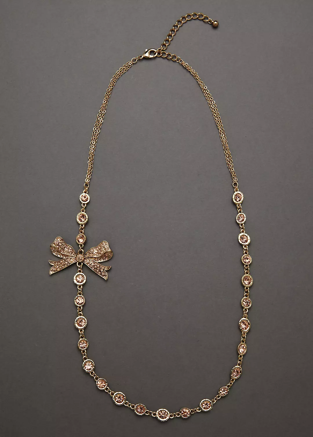 Gold Necklace with Colored Stone Detail and Bow Image